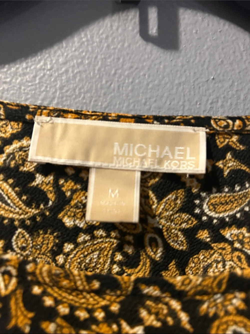Michael Kors Black Top with Gold Floral Print and Side Tie